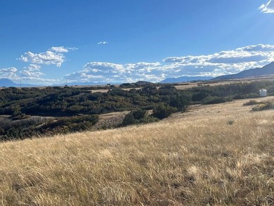 Discover your slice of Colorado paradise on this 1+ acre lot in on Hollydot Golf Course in Colorado - for sale on GolfHomes.com, golf home, golf lot