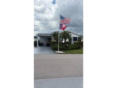 Spacious 3-Bedroom Palm Harbor with Golf Cart in 55+ on Sabal Springs Golf and Racquet Club in Florida - for sale on GolfHomes.com, golf home, golf lot