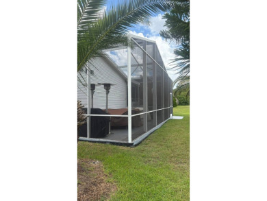 Spacious 3-Bedroom Palm Harbor with Golf Cart in 55+ on Sabal Springs Golf and Racquet Club in Florida - for sale on GolfHomes.com, golf home, golf lot