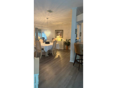 Spacious 3-Bedroom Palm Harbor with Golf Cart in 55+ on Sabal Springs Golf and Racquet Club in Florida - for sale on GolfHomes.com, golf home, golf lot