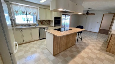 Seller says ,,,,,Get it sold!!!!  New kitchen vinyl plank on Water Oak Country Club Estates in Florida - for sale on GolfHomes.com, golf home, golf lot