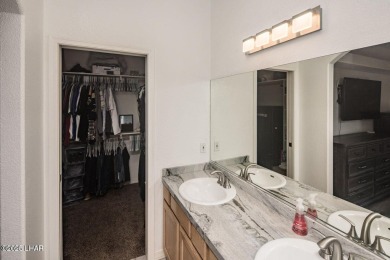 This inviting south-side home features an open concept living on London Bridge Golf Course in Arizona - for sale on GolfHomes.com, golf home, golf lot