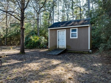 Beautiful home nestled in a private cove with abundance of trees on Holly Lake Ranch Golf Club in Texas - for sale on GolfHomes.com, golf home, golf lot