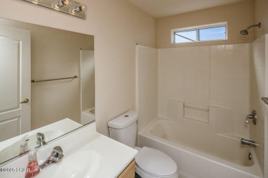 This inviting south-side home features an open concept living on London Bridge Golf Course in Arizona - for sale on GolfHomes.com, golf home, golf lot