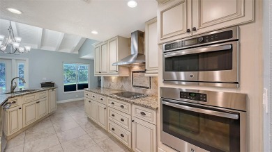 This property offers an ASSUMABLE VA loan for qualified buyers! on Sorrento Par 3 in Florida - for sale on GolfHomes.com, golf home, golf lot