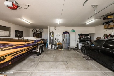 This inviting south-side home features an open concept living on London Bridge Golf Course in Arizona - for sale on GolfHomes.com, golf home, golf lot