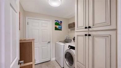 This property offers an ASSUMABLE VA loan for qualified buyers! on Sorrento Par 3 in Florida - for sale on GolfHomes.com, golf home, golf lot
