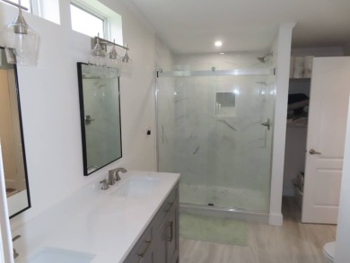 Beautiful newly updated Garage Home just listed in Crane Lakes on Crane Lakes Golf and Country Club in Florida - for sale on GolfHomes.com, golf home, golf lot