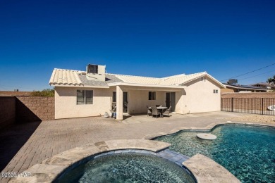 This inviting south-side home features an open concept living on London Bridge Golf Course in Arizona - for sale on GolfHomes.com, golf home, golf lot