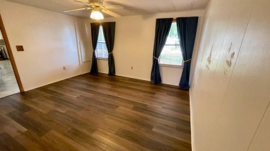 Seller says ,,,,,Get it sold!!!!  New kitchen vinyl plank on Water Oak Country Club Estates in Florida - for sale on GolfHomes.com, golf home, golf lot