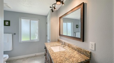 This property offers an ASSUMABLE VA loan for qualified buyers! on Sorrento Par 3 in Florida - for sale on GolfHomes.com, golf home, golf lot