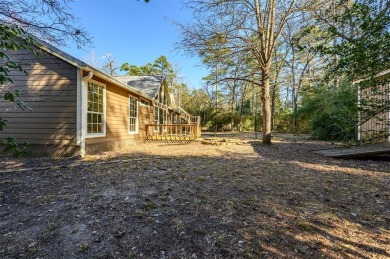 Beautiful home nestled in a private cove with abundance of trees on Holly Lake Ranch Golf Club in Texas - for sale on GolfHomes.com, golf home, golf lot