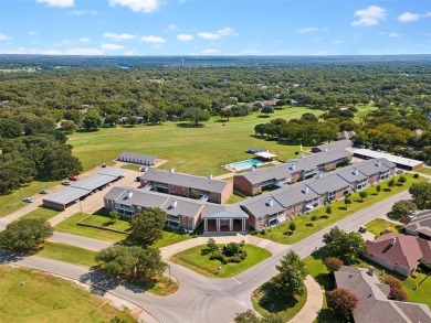 The Fairway Condominiums, located in the country club community on Pecan Plantation Country Club in Texas - for sale on GolfHomes.com, golf home, golf lot