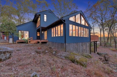 Contemporary Home with Spectacular Lake & Golf Course on Lords Valley Country Club, Inc in Pennsylvania - for sale on GolfHomes.com, golf home, golf lot