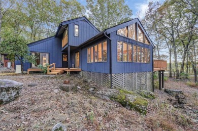 Contemporary Home with Spectacular Lake & Golf Course on Lords Valley Country Club, Inc in Pennsylvania - for sale on GolfHomes.com, golf home, golf lot