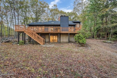 Contemporary Home with Spectacular Lake & Golf Course on Lords Valley Country Club, Inc in Pennsylvania - for sale on GolfHomes.com, golf home, golf lot