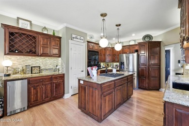 Impressive Home in Sought-After Briarbrook! Tucked into one of on Briarbrook Golf Course in Missouri - for sale on GolfHomes.com, golf home, golf lot