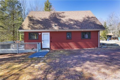 This 3 bed two bath fully remodeled home sits in an Amenity on Pocono Farms Country Club in Pennsylvania - for sale on GolfHomes.com, golf home, golf lot