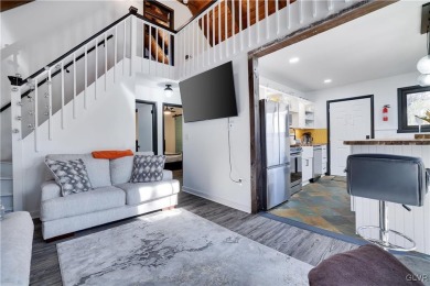 This 3 bed two bath fully remodeled home sits in an Amenity on Pocono Farms Country Club in Pennsylvania - for sale on GolfHomes.com, golf home, golf lot