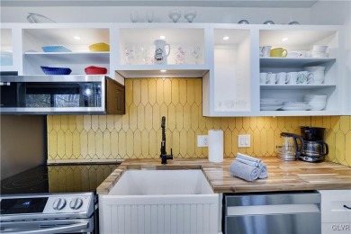 This 3 bed two bath fully remodeled home sits in an Amenity on Pocono Farms Country Club in Pennsylvania - for sale on GolfHomes.com, golf home, golf lot