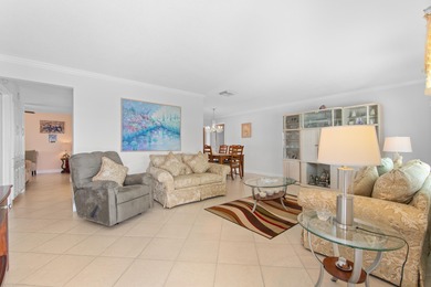 Nestled within 55+ Palm Beach Leisureville, this updated on Leisureville Community Golf Course in Florida - for sale on GolfHomes.com, golf home, golf lot