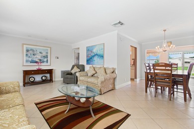 Nestled within 55+ Palm Beach Leisureville, this updated on Leisureville Community Golf Course in Florida - for sale on GolfHomes.com, golf home, golf lot