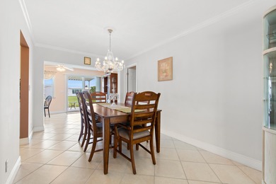 Nestled within 55+ Palm Beach Leisureville, this updated on Leisureville Community Golf Course in Florida - for sale on GolfHomes.com, golf home, golf lot