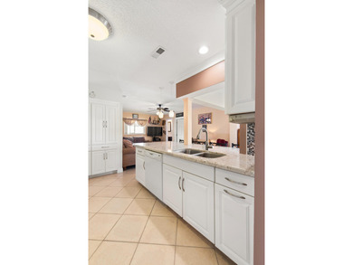 Nestled within 55+ Palm Beach Leisureville, this updated on Leisureville Community Golf Course in Florida - for sale on GolfHomes.com, golf home, golf lot