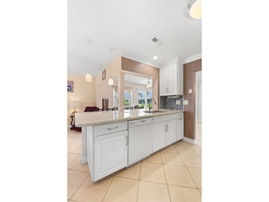 Nestled within 55+ Palm Beach Leisureville, this updated on Leisureville Community Golf Course in Florida - for sale on GolfHomes.com, golf home, golf lot