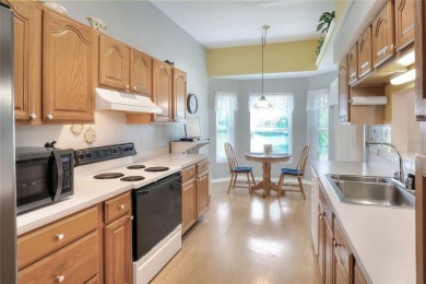 Welcome to this delightful 2-bedroom, 2-bathroom home with a on Sandpiper Golf Club in Florida - for sale on GolfHomes.com, golf home, golf lot