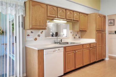 Welcome to this delightful 2-bedroom, 2-bathroom home with a on Sandpiper Golf Club in Florida - for sale on GolfHomes.com, golf home, golf lot