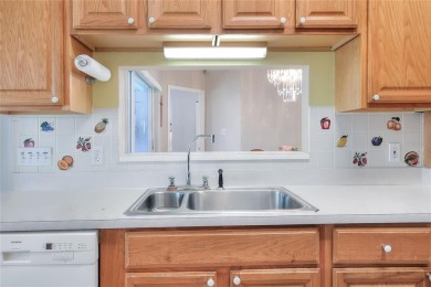 Welcome to this delightful 2-bedroom, 2-bathroom home with a on Sandpiper Golf Club in Florida - for sale on GolfHomes.com, golf home, golf lot