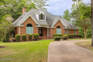 Waterfront home located on the water in a gated community called on Sound Golf Links at Albemarle Plantation in North Carolina - for sale on GolfHomes.com, golf home, golf lot