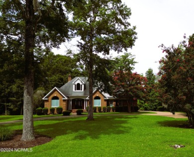 Waterfront home located on the water in a gated community called on Sound Golf Links at Albemarle Plantation in North Carolina - for sale on GolfHomes.com, golf home, golf lot