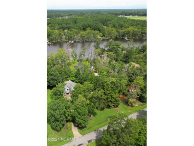 Waterfront home located on the water in a gated community called on Sound Golf Links at Albemarle Plantation in North Carolina - for sale on GolfHomes.com, golf home, golf lot