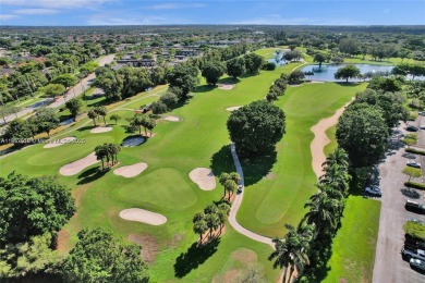 Large corner unit rarely available with a golf and garden view on Pembroke Lakes Golf Club in Florida - for sale on GolfHomes.com, golf home, golf lot