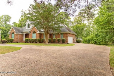 Waterfront home located on the water in a gated community called on Sound Golf Links at Albemarle Plantation in North Carolina - for sale on GolfHomes.com, golf home, golf lot