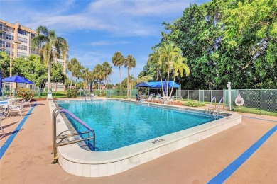 Large corner unit rarely available with a golf and garden view on Pembroke Lakes Golf Club in Florida - for sale on GolfHomes.com, golf home, golf lot