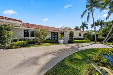 This stunning 5 Bedroom plus Den home overlooking the North Palm on North Palm Beach Country Club in Florida - for sale on GolfHomes.com, golf home, golf lot