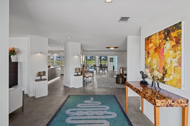 This stunning 5 Bedroom plus Den home overlooking the North Palm on North Palm Beach Country Club in Florida - for sale on GolfHomes.com, golf home, golf lot