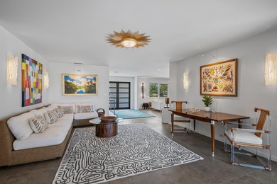 This stunning 5 Bedroom plus Den home overlooking the North Palm on North Palm Beach Country Club in Florida - for sale on GolfHomes.com, golf home, golf lot