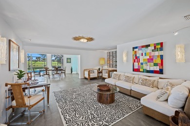 This stunning 5 Bedroom plus Den home overlooking the North Palm on North Palm Beach Country Club in Florida - for sale on GolfHomes.com, golf home, golf lot