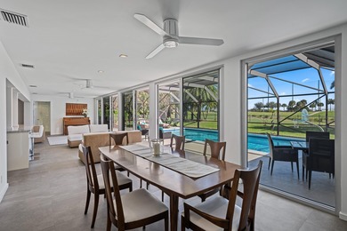 This stunning 5 Bedroom plus Den home overlooking the North Palm on North Palm Beach Country Club in Florida - for sale on GolfHomes.com, golf home, golf lot