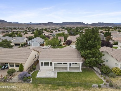 Located on the 4th hole of Dayton Valley Golf Club, this home on Dayton Valley Golf Club At Legado in Nevada - for sale on GolfHomes.com, golf home, golf lot