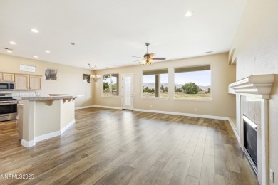 Located on the 4th hole of Dayton Valley Golf Club, this home on Dayton Valley Golf Club At Legado in Nevada - for sale on GolfHomes.com, golf home, golf lot