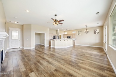 Located on the 4th hole of Dayton Valley Golf Club, this home on Dayton Valley Golf Club At Legado in Nevada - for sale on GolfHomes.com, golf home, golf lot