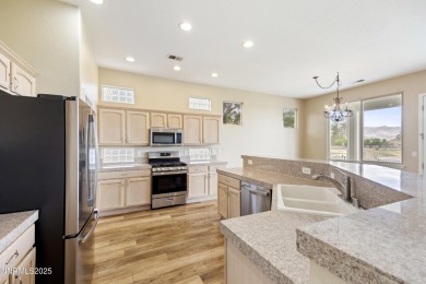 Located on the 4th hole of Dayton Valley Golf Club, this home on Dayton Valley Golf Club At Legado in Nevada - for sale on GolfHomes.com, golf home, golf lot