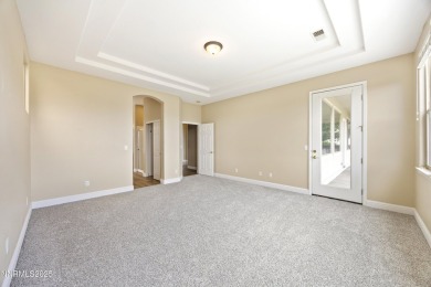 Located on the 4th hole of Dayton Valley Golf Club, this home on Dayton Valley Golf Club At Legado in Nevada - for sale on GolfHomes.com, golf home, golf lot