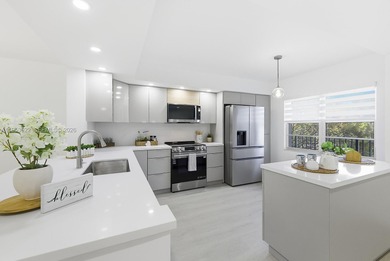 Experience luxury living in this stunning golf-view residence on Flamingo Lakes Country Club in Florida - for sale on GolfHomes.com, golf home, golf lot