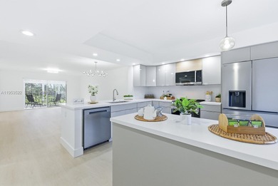 Experience luxury living in this stunning golf-view residence on Flamingo Lakes Country Club in Florida - for sale on GolfHomes.com, golf home, golf lot